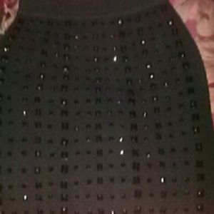 A black skirt with rinstones