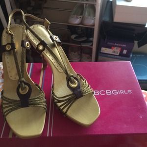 Never been worn BCBGirls chocolate/gold heels