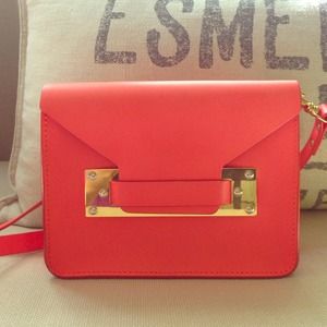 Sophie Hulme mini envelope bag in coral