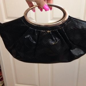 Black clutch,used once. Practically new.
