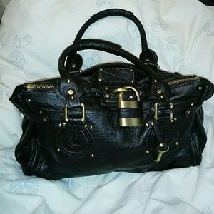 Faux leather purse with lock and key