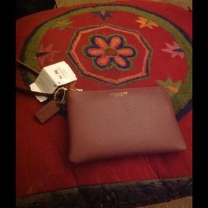 SOLD.  Authentic Coach Wristlet