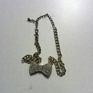 Gold and silver bow necklace