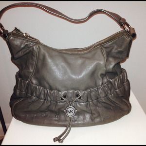 Authentic Michael Kors gray purse.