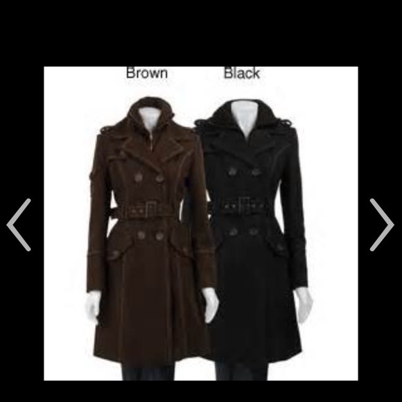 Modern wool coat with white stitching details.