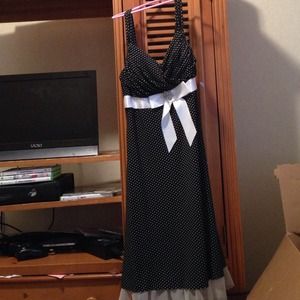 Black and white polka dot dress with white bow