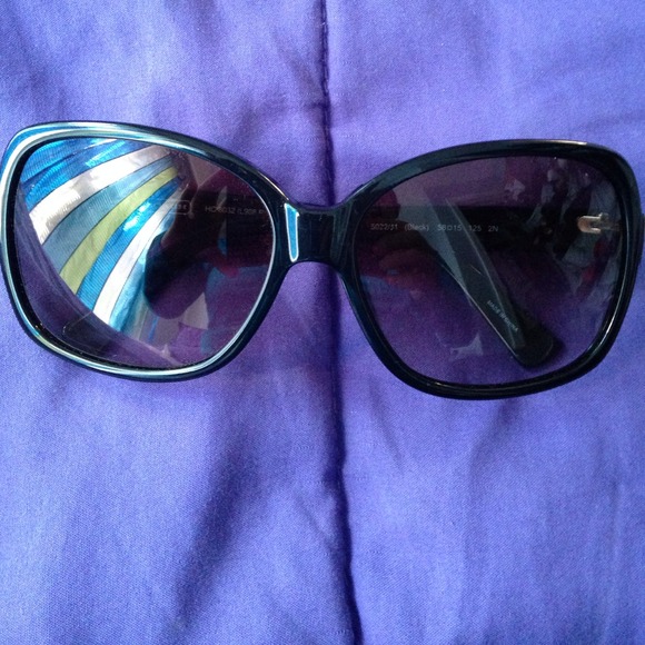 Brand new black coach sunglasses.