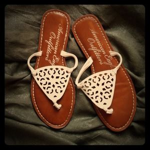 White leather flip flops