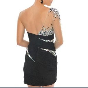 Size 2 black homecoming dress never been worn.