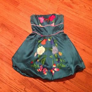 Strapless satin dress with bubble skirt