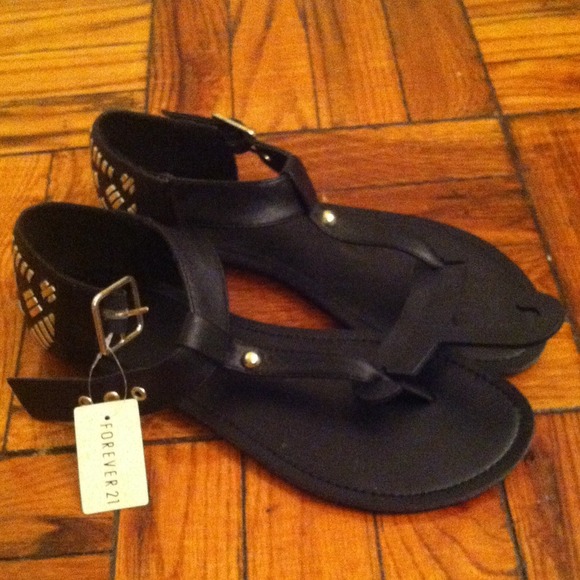 Black and gold thong sandals