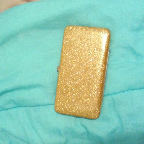 Gold sparkly clutch/wallet.