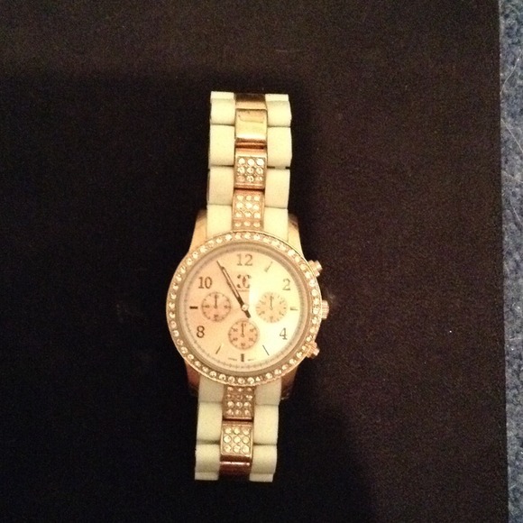 Gold and white watch