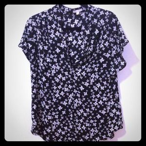 Black top with white pinwheel design