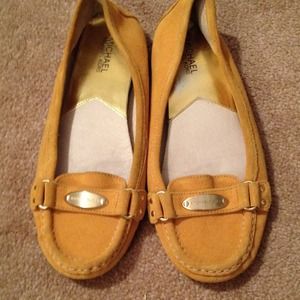 MK mustard colored flats