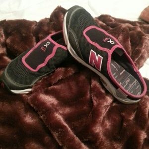 Cute.... New Balance slide on tennis shoes.