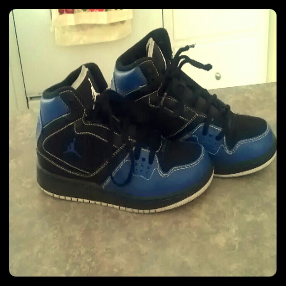 Blue and black jordans