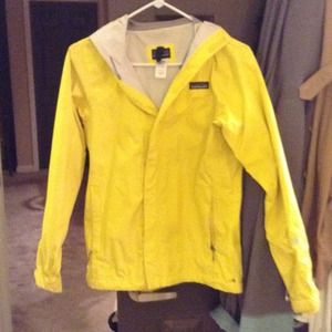 Bright yellow Patagonia rain jacket