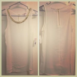 White silky like blouse with gold braided chain