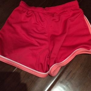 reddish pink athletic shorts