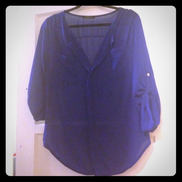 Cerulean blue sheer top.