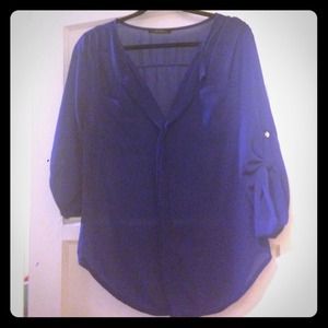 Cerulean blue sheer top.