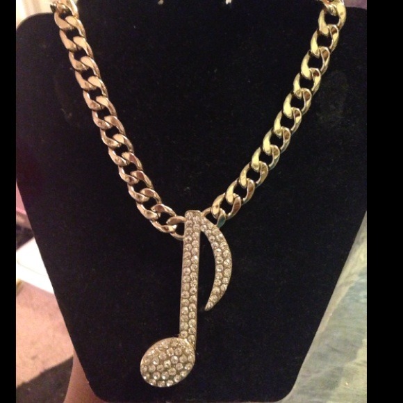 Gold-plated Cuban Link w/ clef note necklace