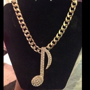 Gold-plated Cuban Link w/ clef note necklace