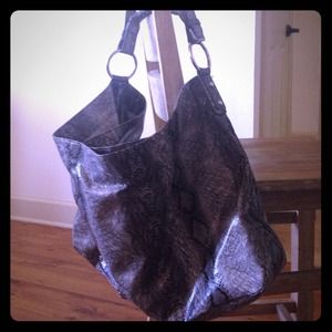 Oversized, snake skin print purse