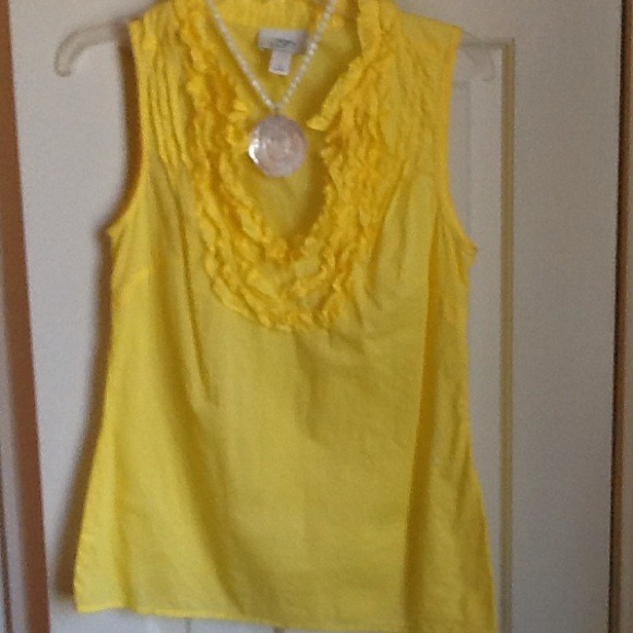 Ruffled sleeveless blouse