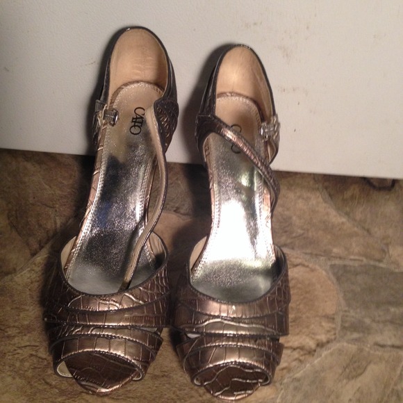 Copperish colored high heels. Size 10