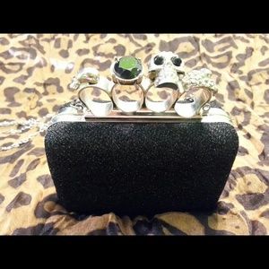 Black and silver knuckle clutch
