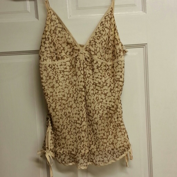 Adjustable straps on a 100% silk very sexy top