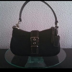 Small black signature coach!