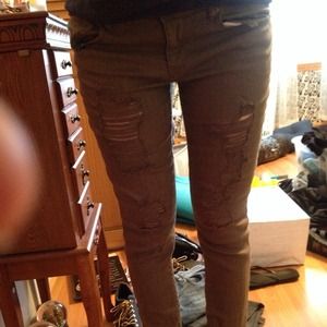 shredded olive green jeans