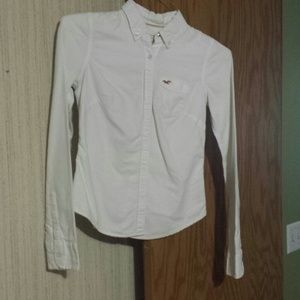 White but on down shirt.