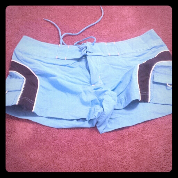 Light blue shorts with navy stripe