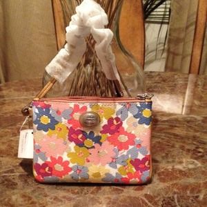 #103.  New Coach Peyton Floral Wristlet