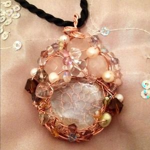 Wire wrapped pendant.