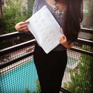 Zara white clutch stressed