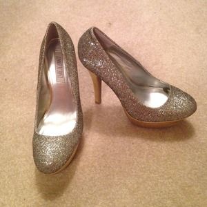 Silver and gold Jennifer Lopez pumps
