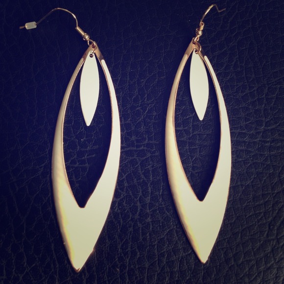 White and gold tone earrings