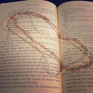 Pale pink dainty choker necklace.