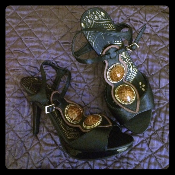 Black stilettos with gold detail