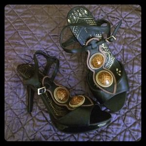 Black stilettos with gold detail