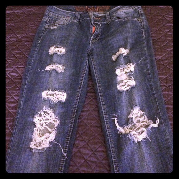 Distressed denim jeans