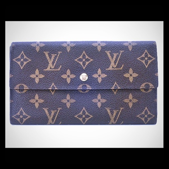 On hold authentic Louis Vuitton Porte tresor walle