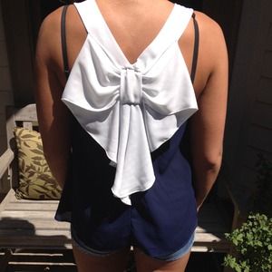 Cute blue top with white bow