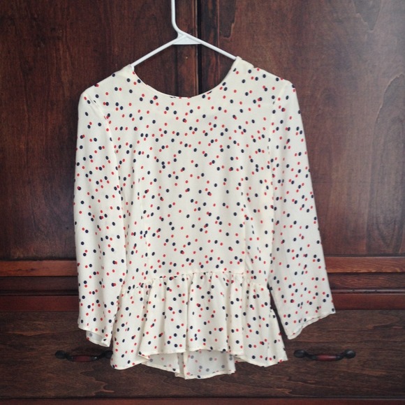 Adorable peplum cream top