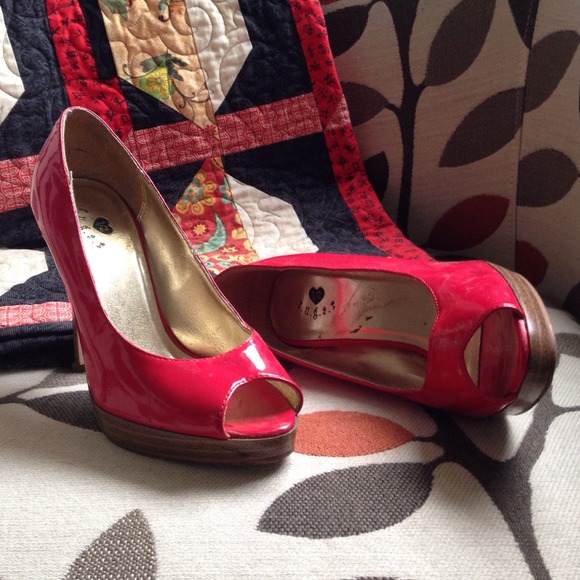 Fire-engine red peep toe heels